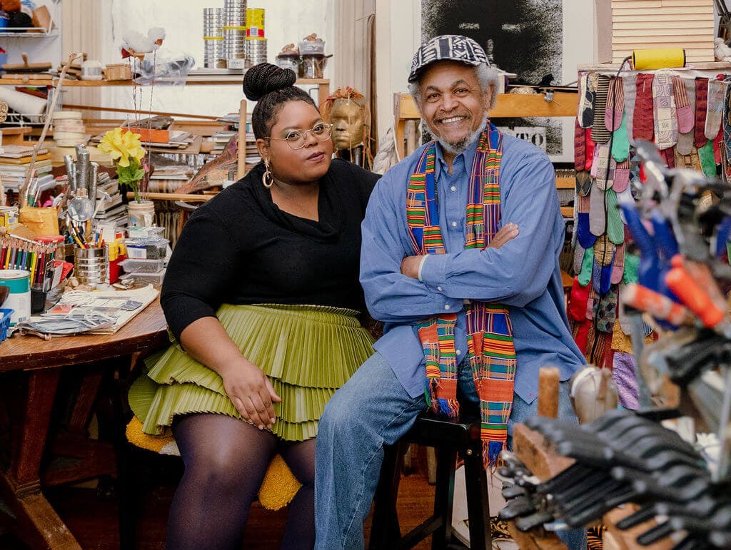 Chanel Thervil with Napoleon Jones Henderson inside his Roxbury home.